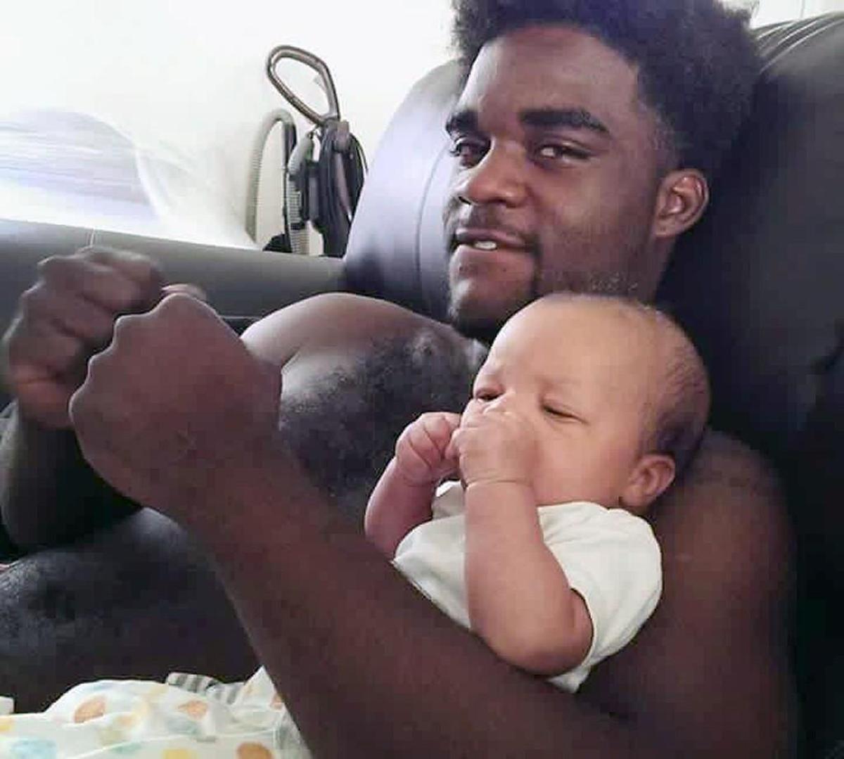 Akiel Denkins and his son, Kashmere.