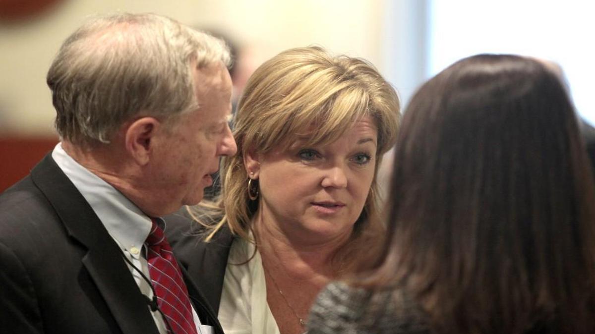 From left, former NC Justice Bob Orr, attorney Christine Mumma and Mumma coworker Cheryl Sullivan speak briefly during the afternoon recess in Mumma's disciplinary hearing by the NC State Bar in Raleigh, NC Wednesday afternoon, January 13, 2016. The case against Mumma, head of the NC Center on Actual Innocence is being heard on allegations of professional misconduct while investigating the innocence claim of then-convicted Joseph Sledge in a double homicide from 1976. The case is expected to continue through this week.