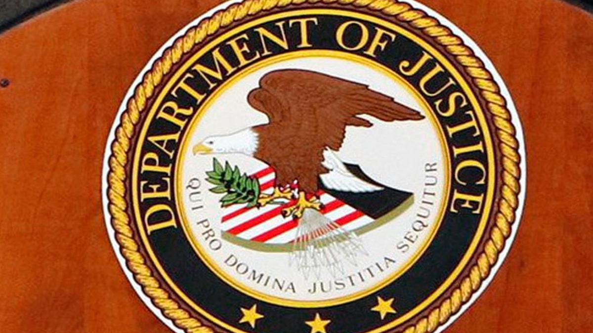 The seal of the U.S. Department of Justice.