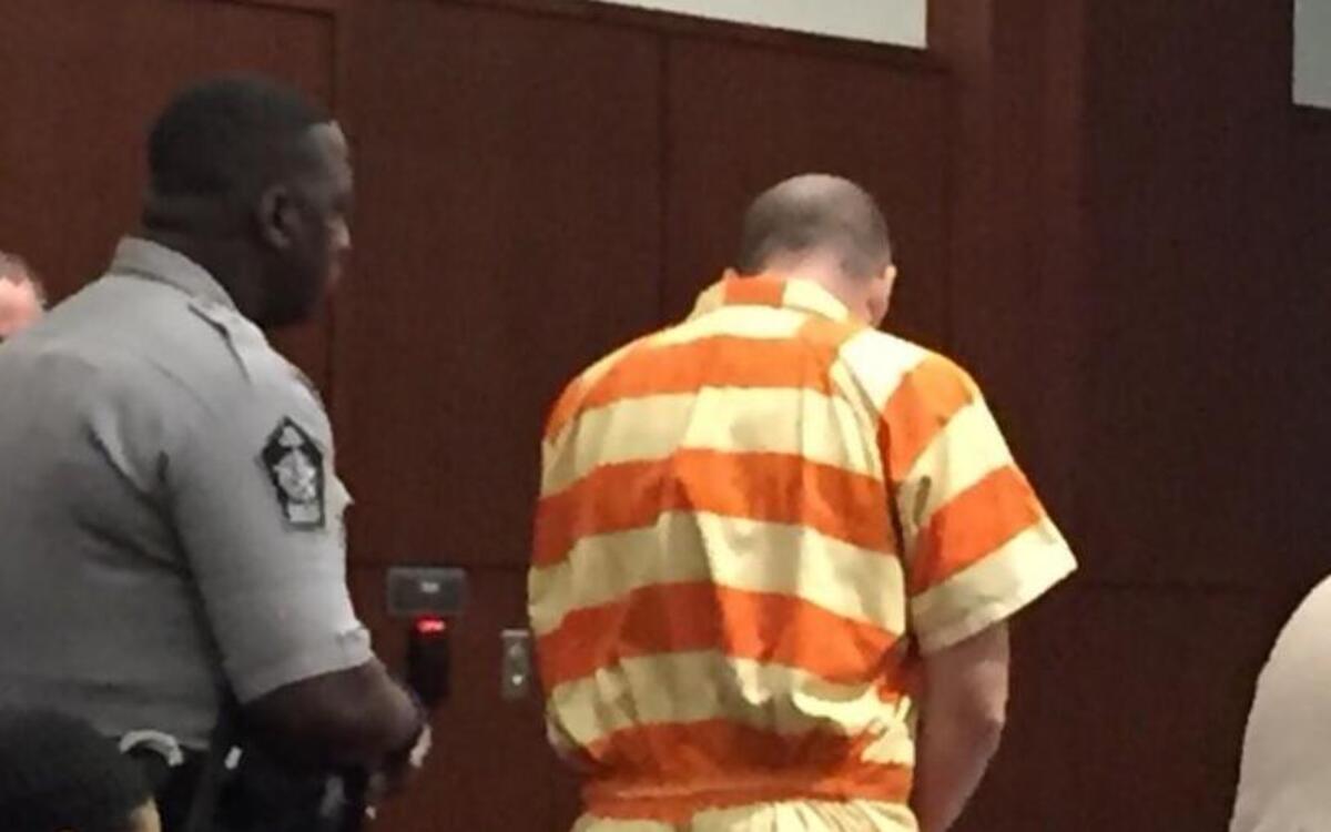 Lanson Paul Stalt stands with his head bowed while being sentenced to life without parole for the 2015 murder of his wife, Stephanie Lynn Autry in Wake Forest. He never raised his head during the proceeding.