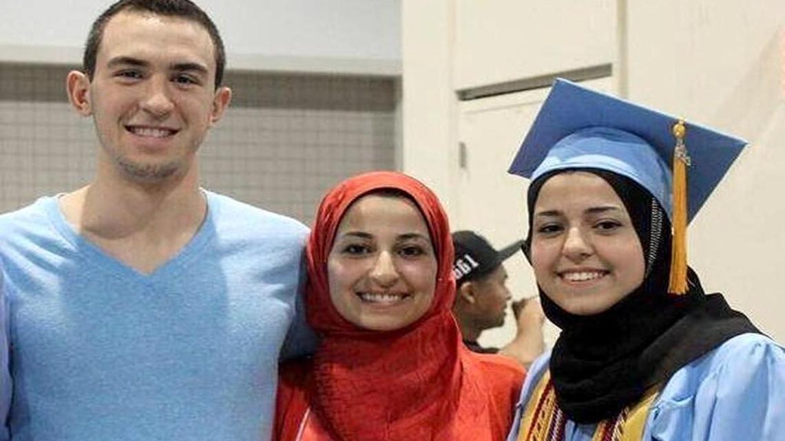 Deah Barakat, 23, (left) his wife Yusor Abu-Salha, 21,(center) and Abu-Salha’s sister, Razan Abu-Salha, 19, of Raleigh.