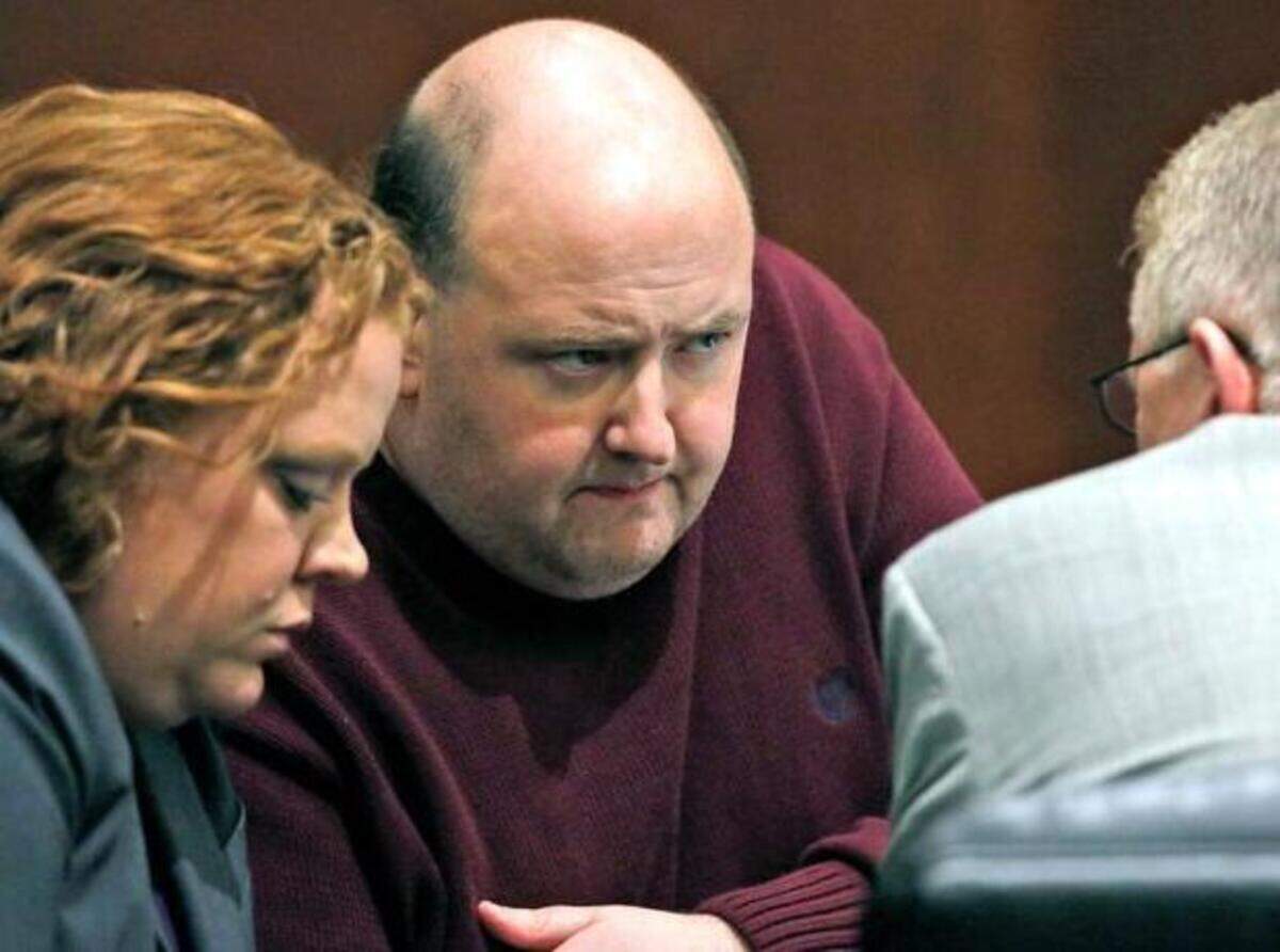 
Murder defendant Jonathan Broyhill, center, confers with his defense attorneys Caroline Elliott, left, and Joseph Arbour, right, during a break in late afternoon testimony in Wake Superior Court Friday, March 6, 2015. Friday is the third day of testimony in Broyhill's murder trial for the April 2013 slaying of Jamie Hahn and attempted murder of her husband Nation Hahn. 
