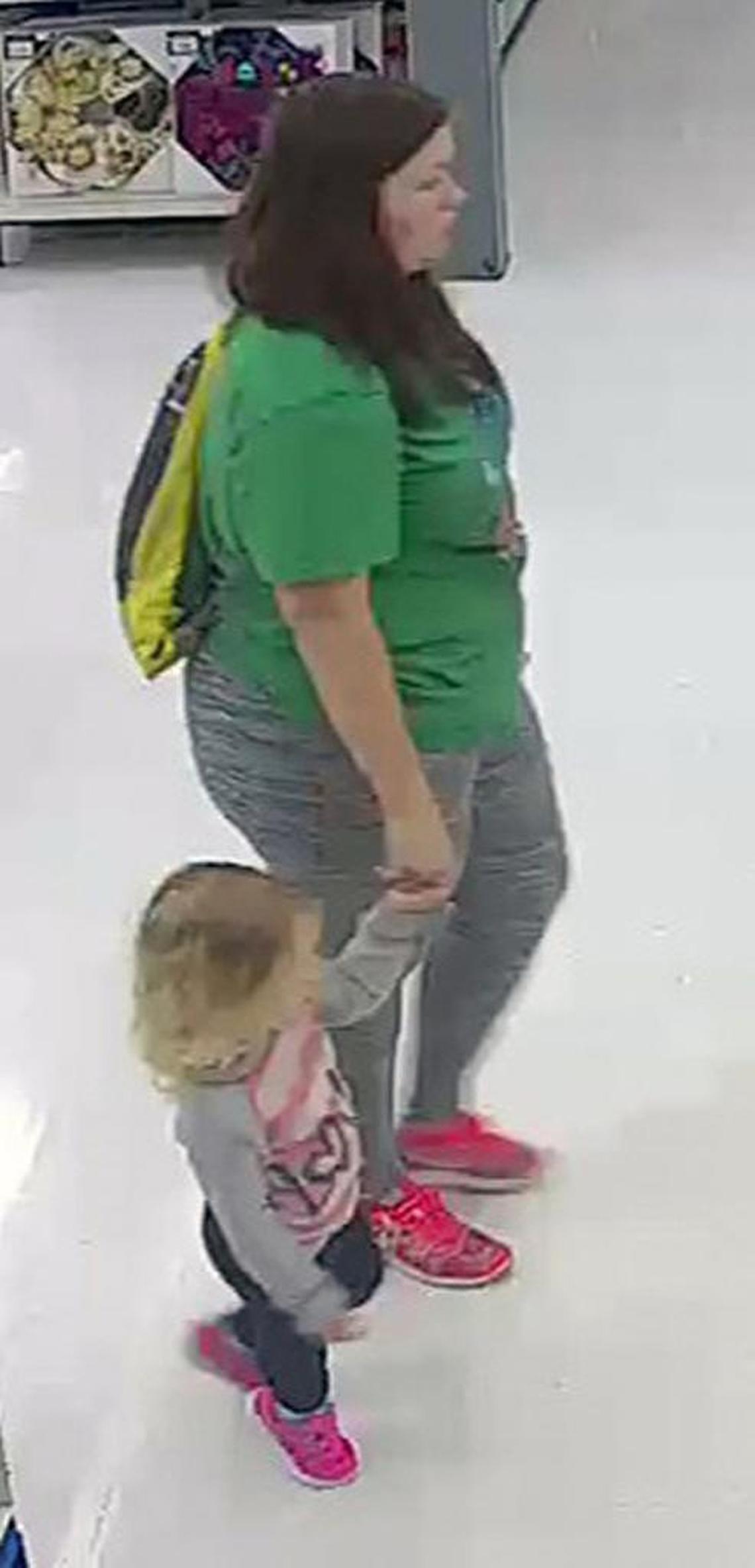 A surveillance image of a woman and child of interest in the case of missing 3-year-old Mariah Woods, taken at the Walmart in Morehead City, N.C. about 9:30 a.m. Monday, Nov. 27, 2017.