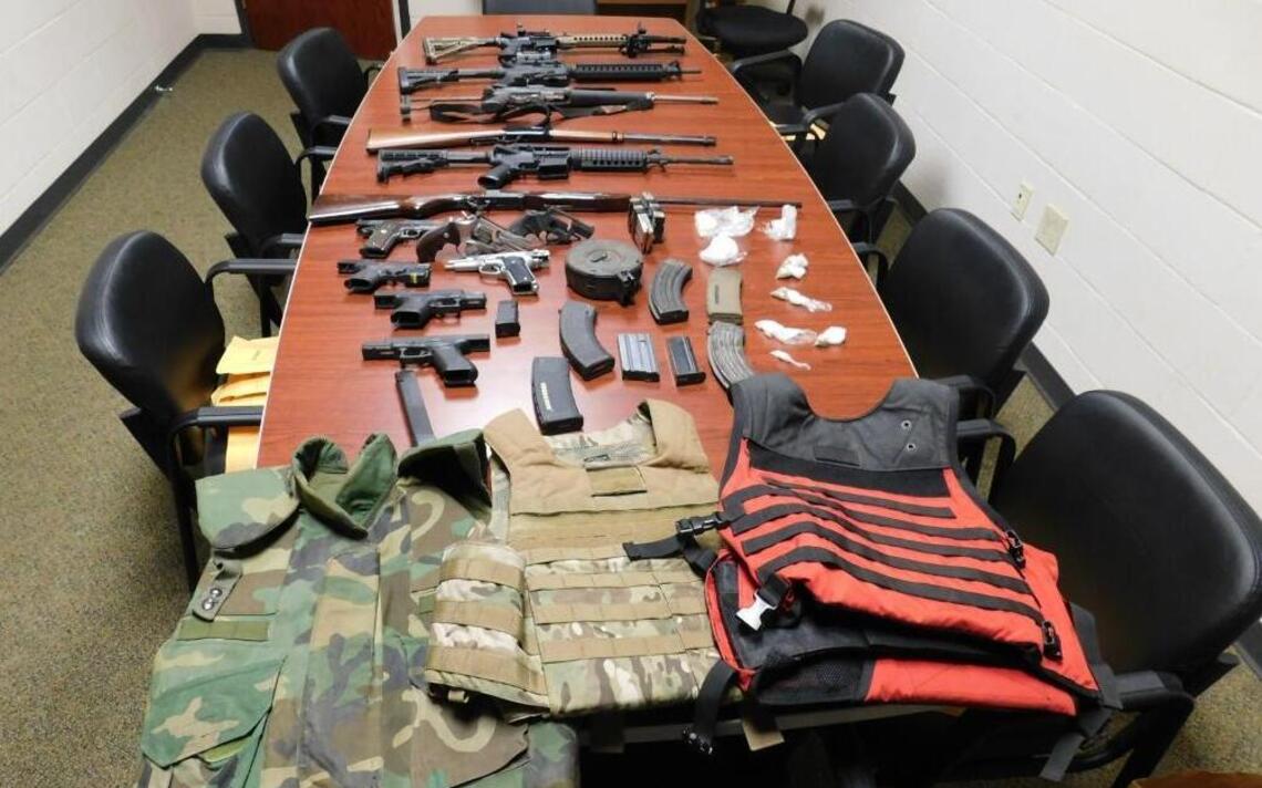 Orange County deputies, looking for drugs, find cocaine and 13 guns in home