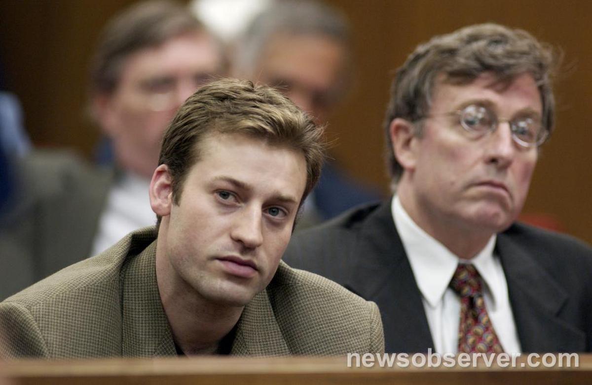 From left, Mike Peterson’s son, Todd Peterson, and Bill Peterson, Mike Peterson’s brother, pay attention to the proceedings Thursday, May 1, 2003 during a hearing in the murder case of Mike Peterson.