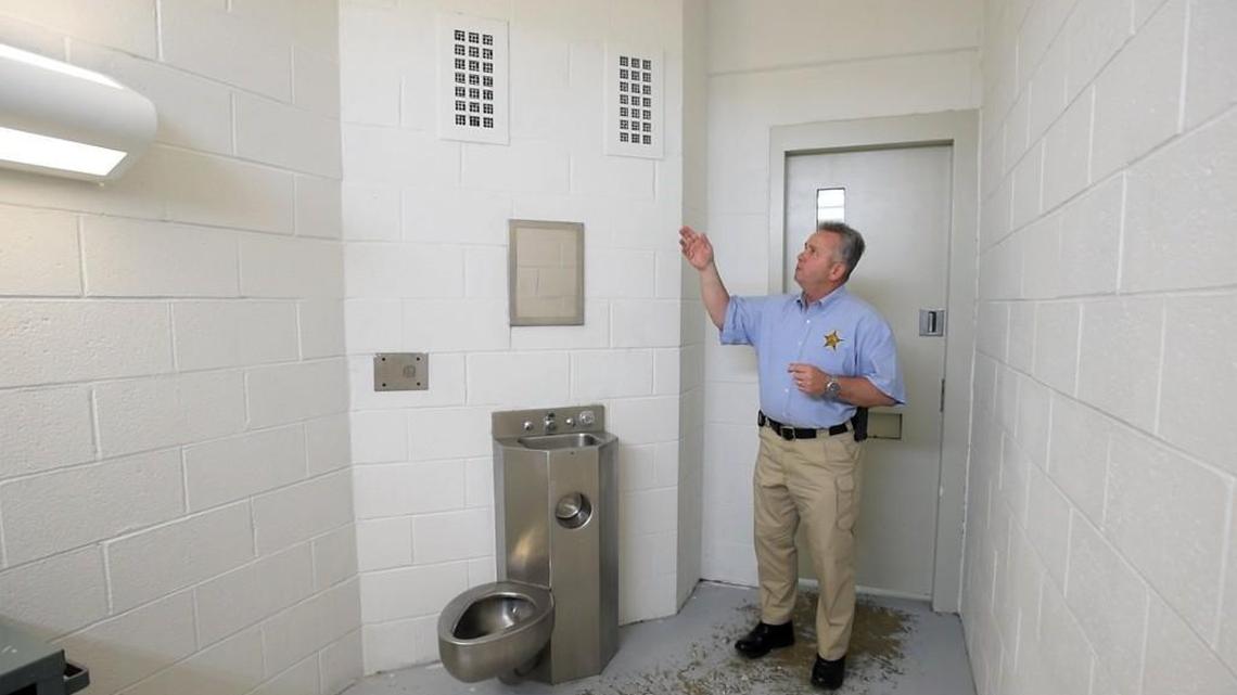 Durham County Sheriff Mike Andrews on June 6, 2016, discusses the old grates in jail cells which were replaced with new “suicide proof” grates in a wing of the Durham County Detention Center.