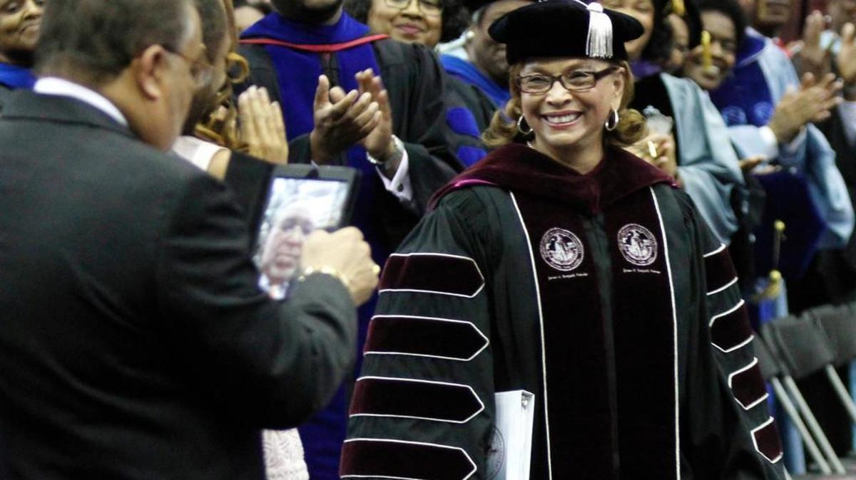 NC Central Chancellor Debra Saunders-White, right, gets a standing ovation during her processional in to in the McDougald-McLendon gymnasium on the NCCU campus Friday, April 4, 2014. Hundreds witnessed the nearly three hour installation ceremony for Saunders-White, the 11th Chancellor at NC Central.