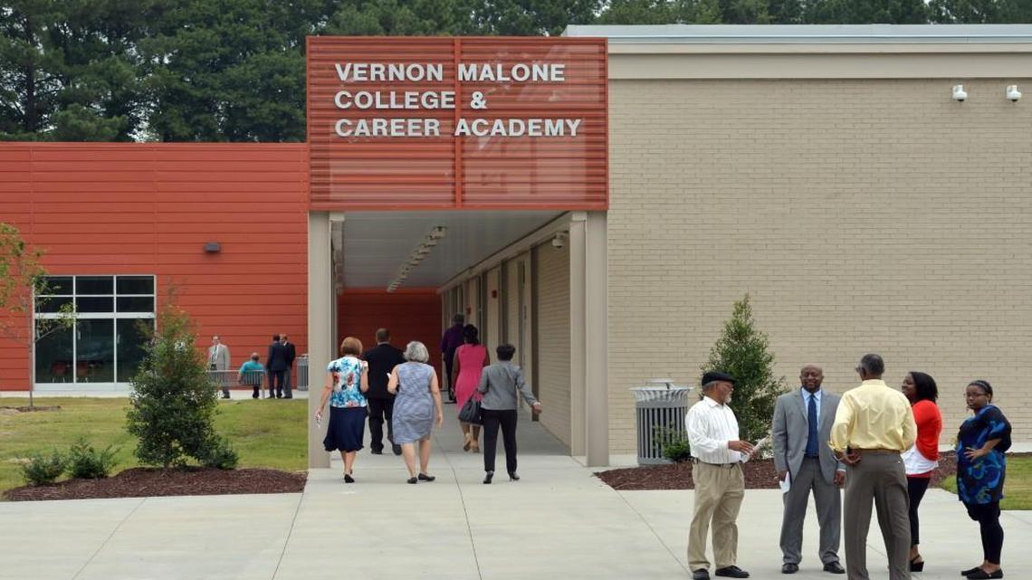 Visitors mingle as they tour the Vernon Malone College & Career Academy on South Wilmington Street in Raleigh, N.C. Friday, August 8, 2014. The school experienced significant flooding from Hurricane Matthew.