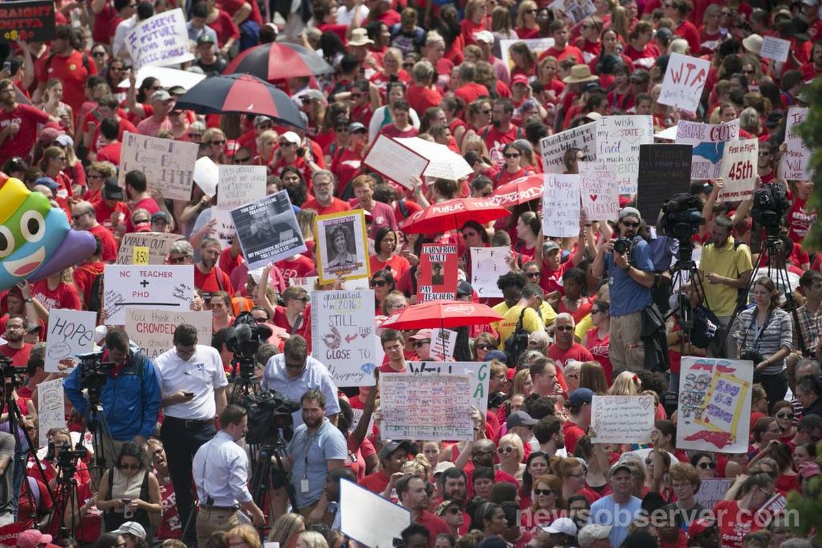 North Carolina teachers pack the Bicentennial Mall for their rally on Wednesday, May 16, 2018 in Raleigh, N.C. Another mass teacher rally is scheduled in Raleigh for May 1, 2026.