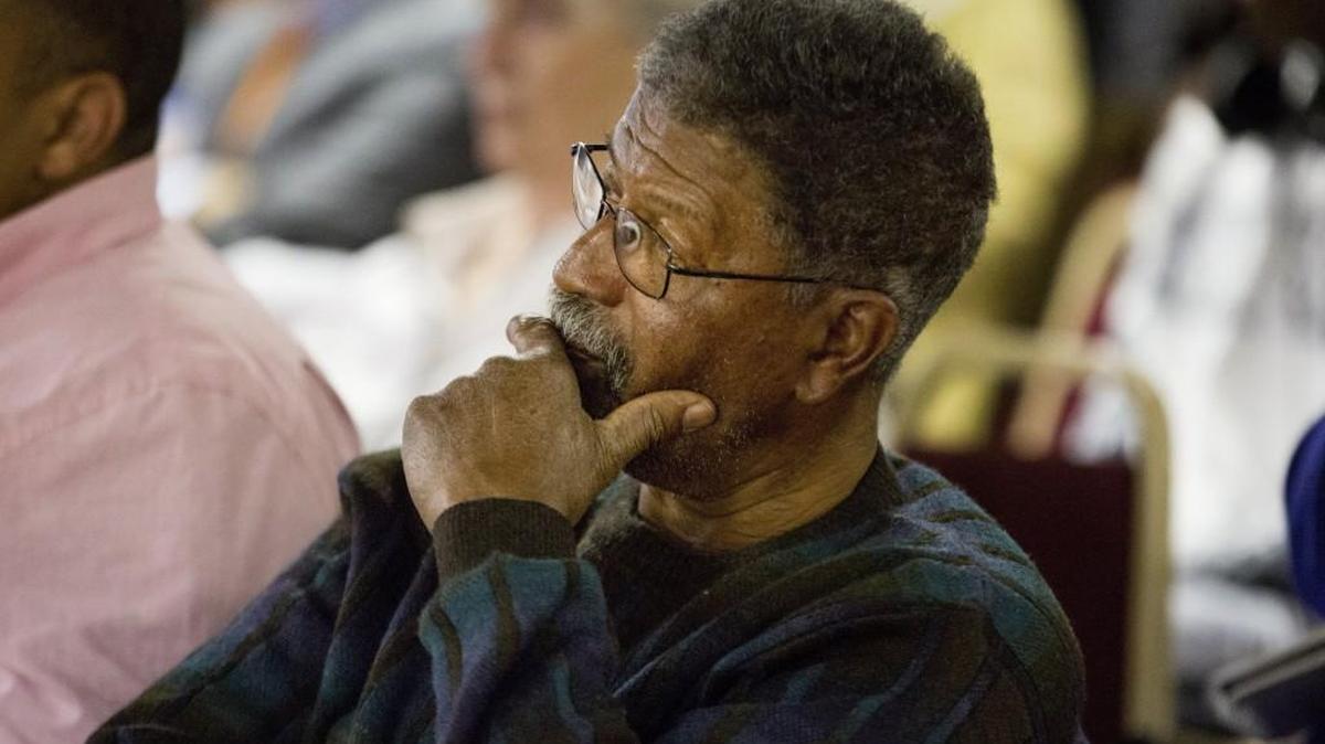Sam Ollison listens during a forum where Wake County parents, students and community members shared concerns with the U.S. Department of Education's Office for Civil Rights Tuesday, April 12, 2016 in Raleigh.