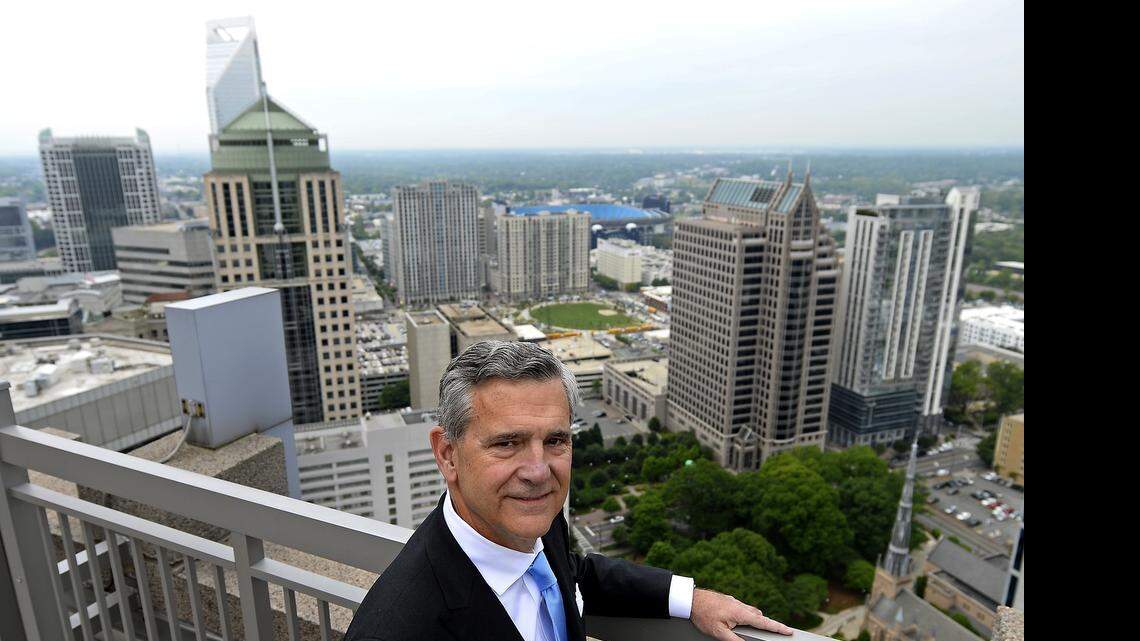 
John Fennebresque, on a balcony at his McGuireWoods office on Tryon Street, has been a powerful player in civic life since he arrived in Charlotte in 1973. 

