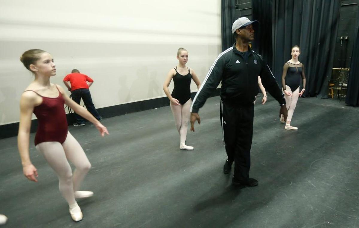 Mel Tomlinson works with members of the Ligon GT Magnet Middle School dance company and alumni of the Ligon dance company at Ligon Middle School on Jan. 21, 2016. Tomlinson attended the school in the late 1960s and went on to become an award-winning dancer.