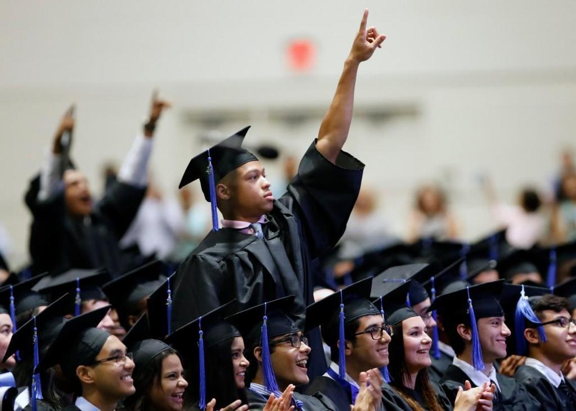 Some Panther Creek High School grads stood in celebration after the students turned their tassels in June 2016 at the Raleigh Convention Center.