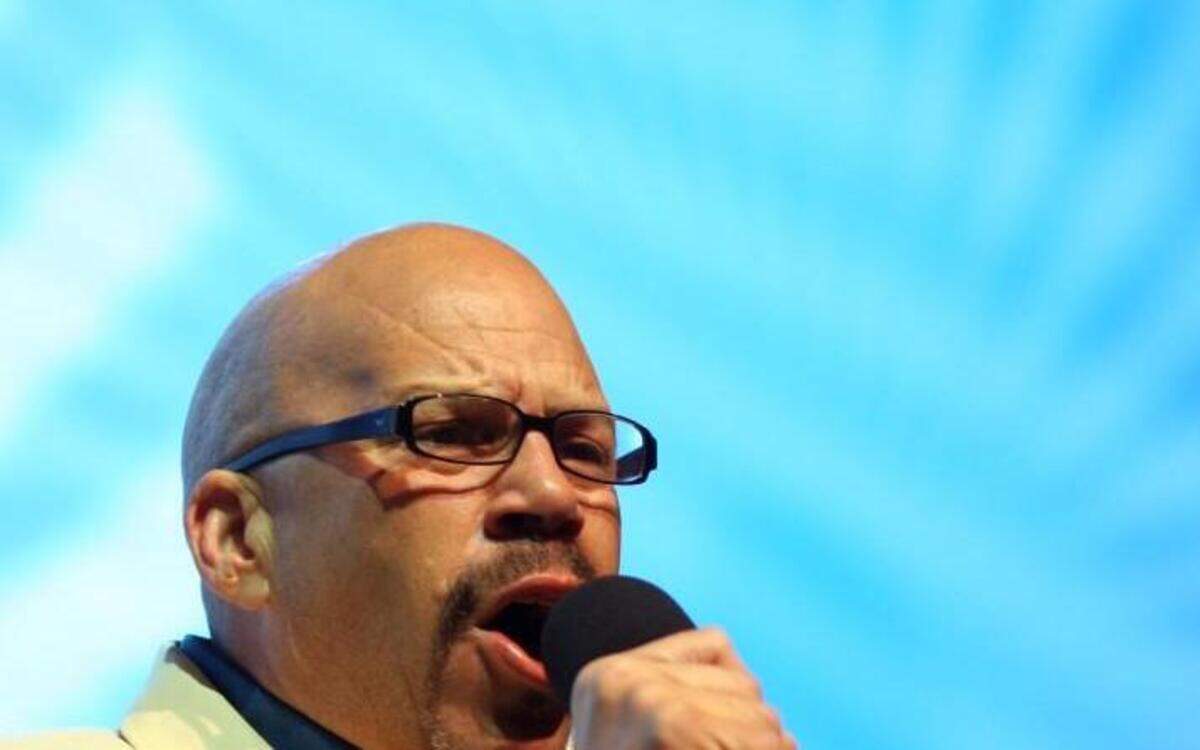 Tom Joyner pumps up the crowd at A Sky Show, a live broadcast of his morning radio show at what was then the Progress Energy Center for the Performing Arts in Raleigh in 2007. Joyner will deliver the commencement address at Shaw University next month.