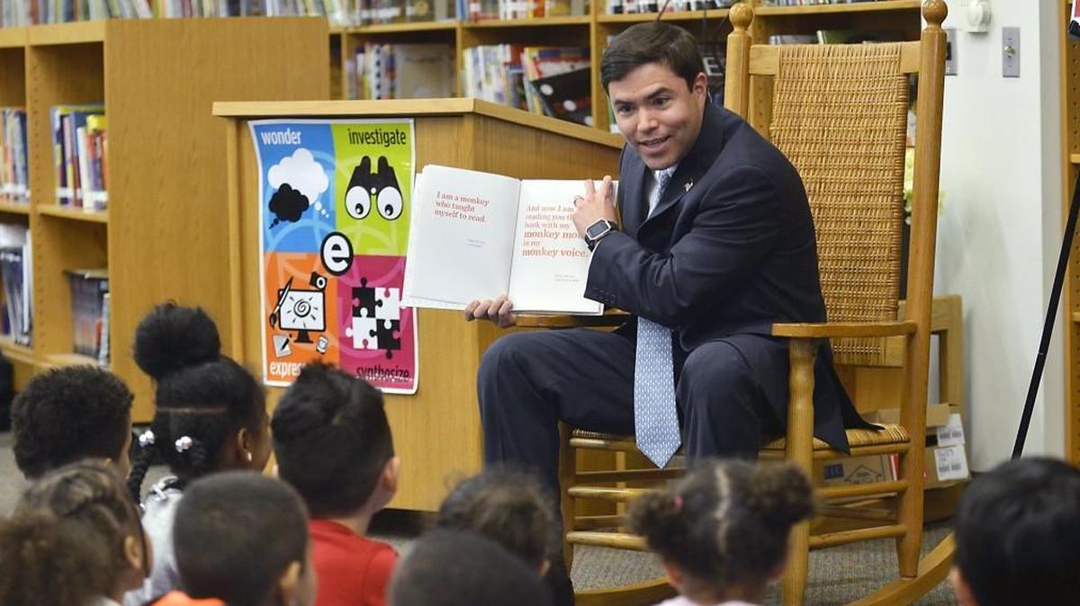 N.C. Schools Superintendent Mark Johnson reads a book to kindergarteners during his visit at East Garner Elementary School in Garner on April 3, 2017.
