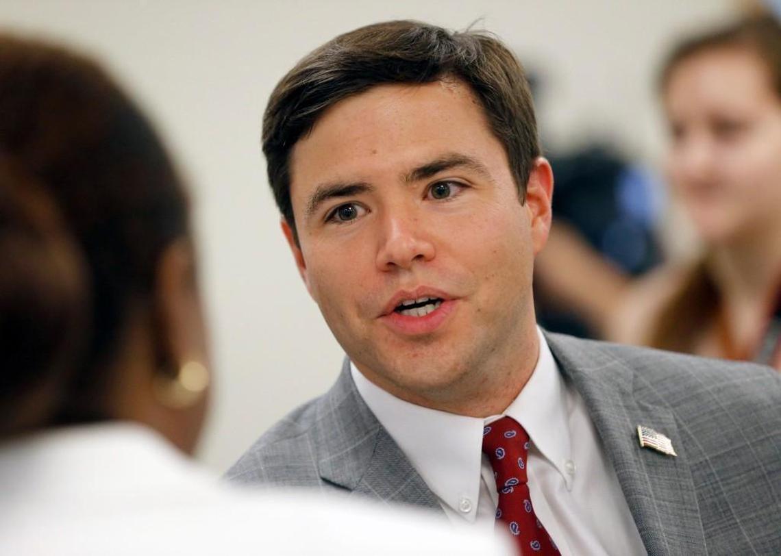 N.C. Superintendent of Public Instruction Mark Johnson talks with some of the adults in the room after he read books to kids at the Wake County Child Health Clinic in Raleigh, NC, on June 6, 2017.