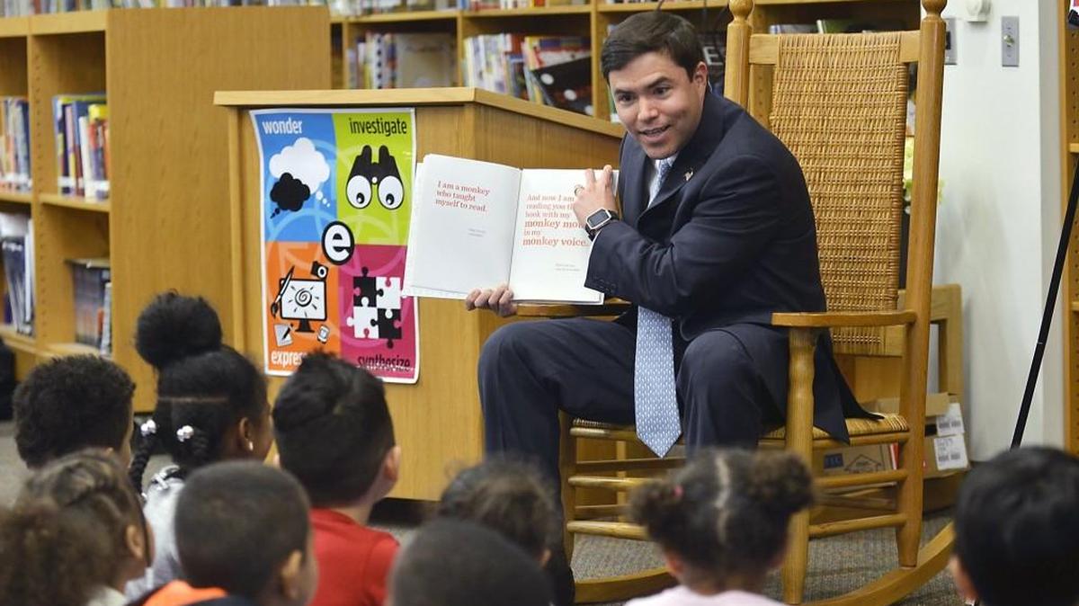N.C. Schools Superintendent Mark Johnson reads a book to kindergarteners during his visit at East Garner Elementary School in Garner, N.C. on April 3, 2017. Johnson says he’s against arming teachers as a way to deal with school safety issues.