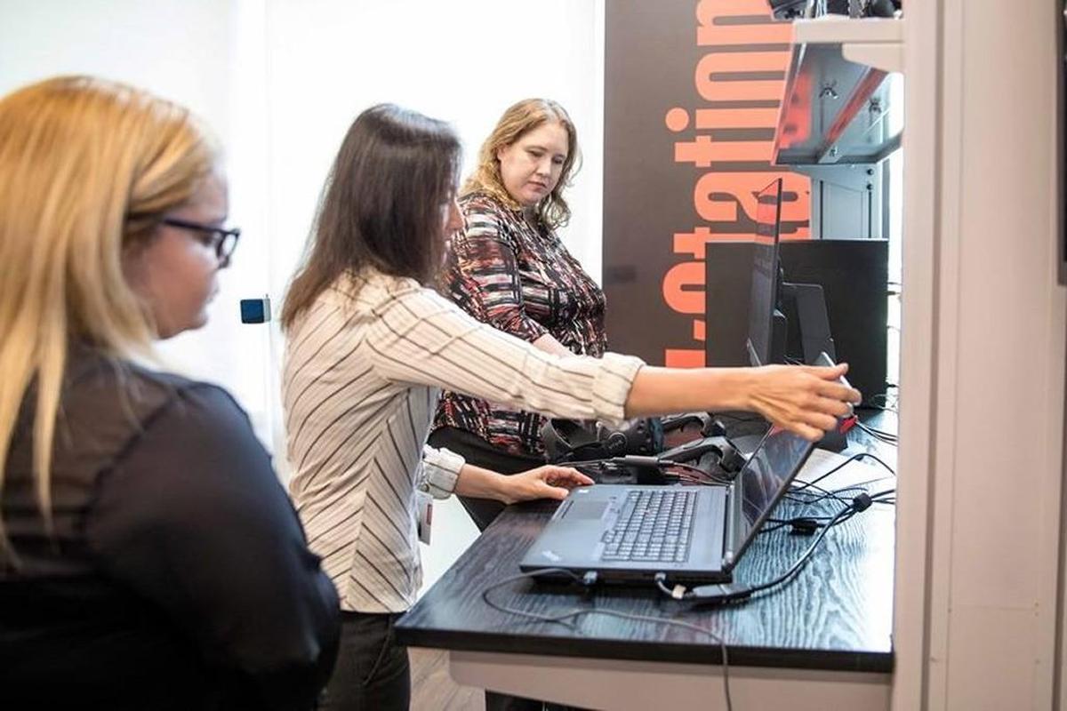 From left, Wake Tech students Shantal Grullon, Gwn Nguyen and Lauren Speakman began interning at tech company Lenovo in May.