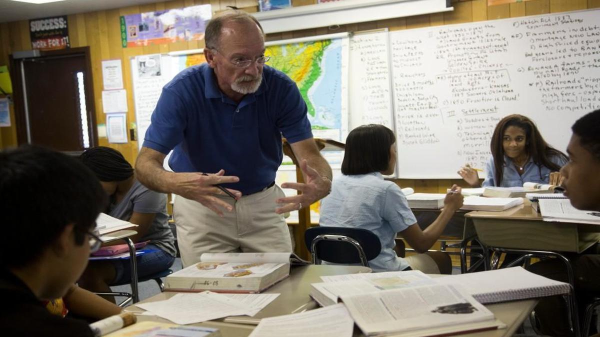 Joe Barley-Maloney teaches a tenth-grade American History II class on Aug. 4, 2014 at Southeast Raleigh High School. The Wake County school budget request has money set aside to change the magnet school theme at Southeast Raleigh High.