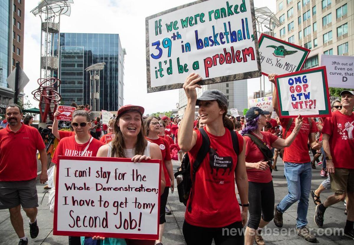 Thousands of teachers march on Fayetteville Street to the N.C. Legislative building in Raleigh on May 16, 2018, during the “March for Students and Rally for Respect.” NCAE is organizing another march in Raleigh on Friday.