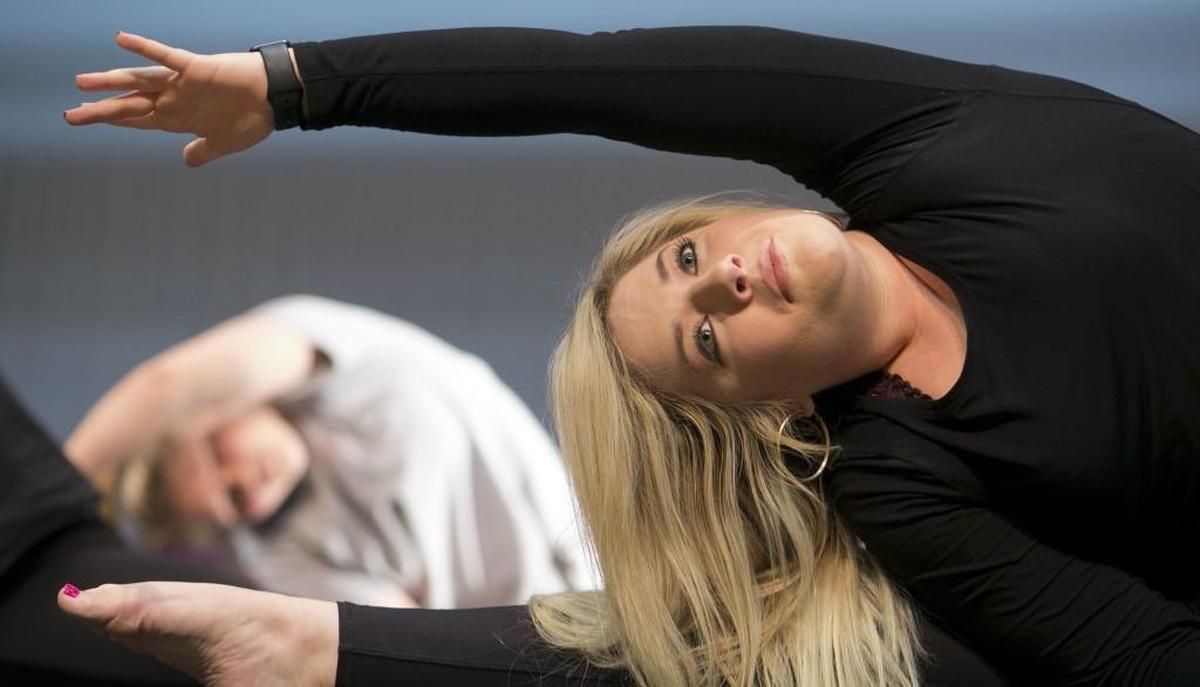 Broughton High School dance teacher Betsy Graves works with her Dance Ensemble class on Tuesday, May 9, 2017 in the auditorium at Broughton High School in Raleigh, N.C. Graves was named the 2017-18 Wake County Teacher of the Year.