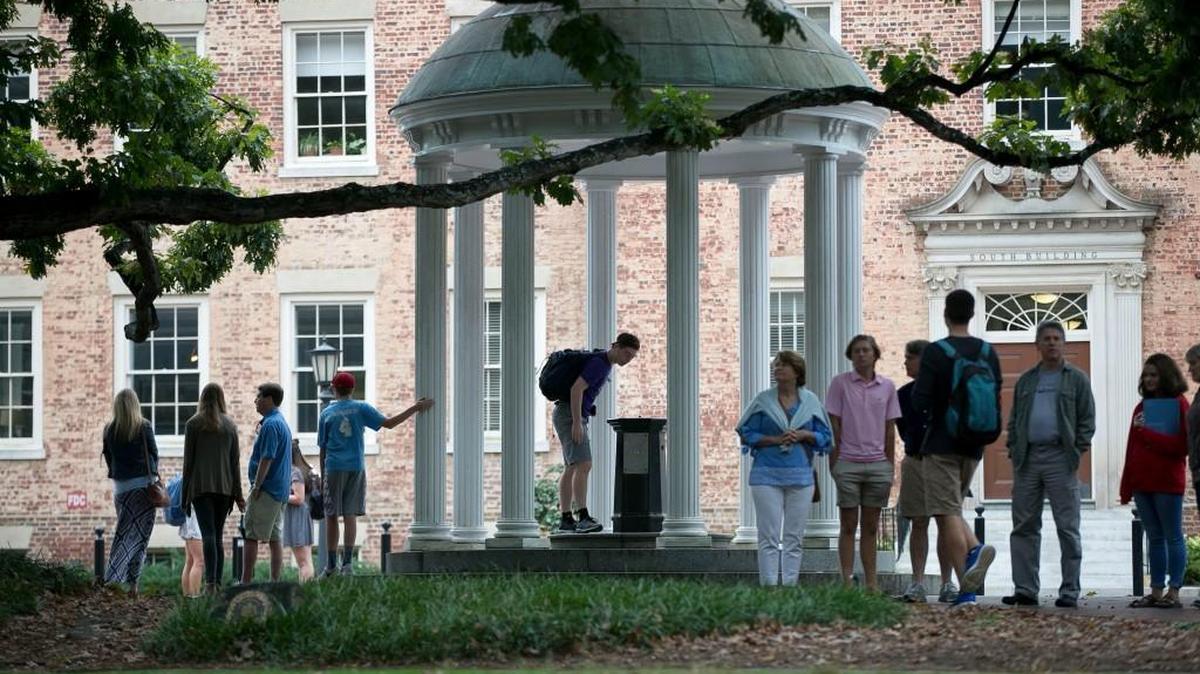A steady stream of visitors and students visit the Old Well on the UNC-Chapel Hill campus on Friday, October 13, 2017.
