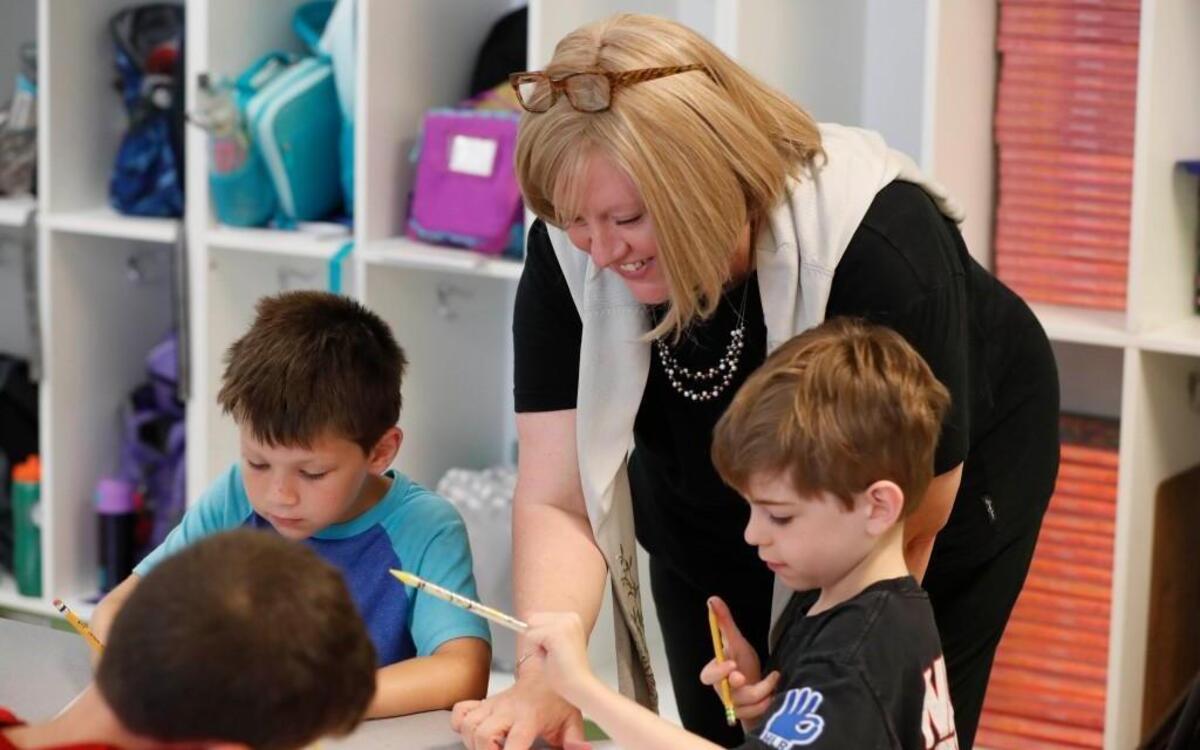 Engineering specialist Stephanie Wright works with second graders Cohen Hoffman, left, and Dylan Kampfer at Sycamore Creek Elementary School in Raleigh, N.C., Thursday, August 24, 2017. Sycamore Creek received an A grade from the state for the school’s performance on 2017-18 state exams.