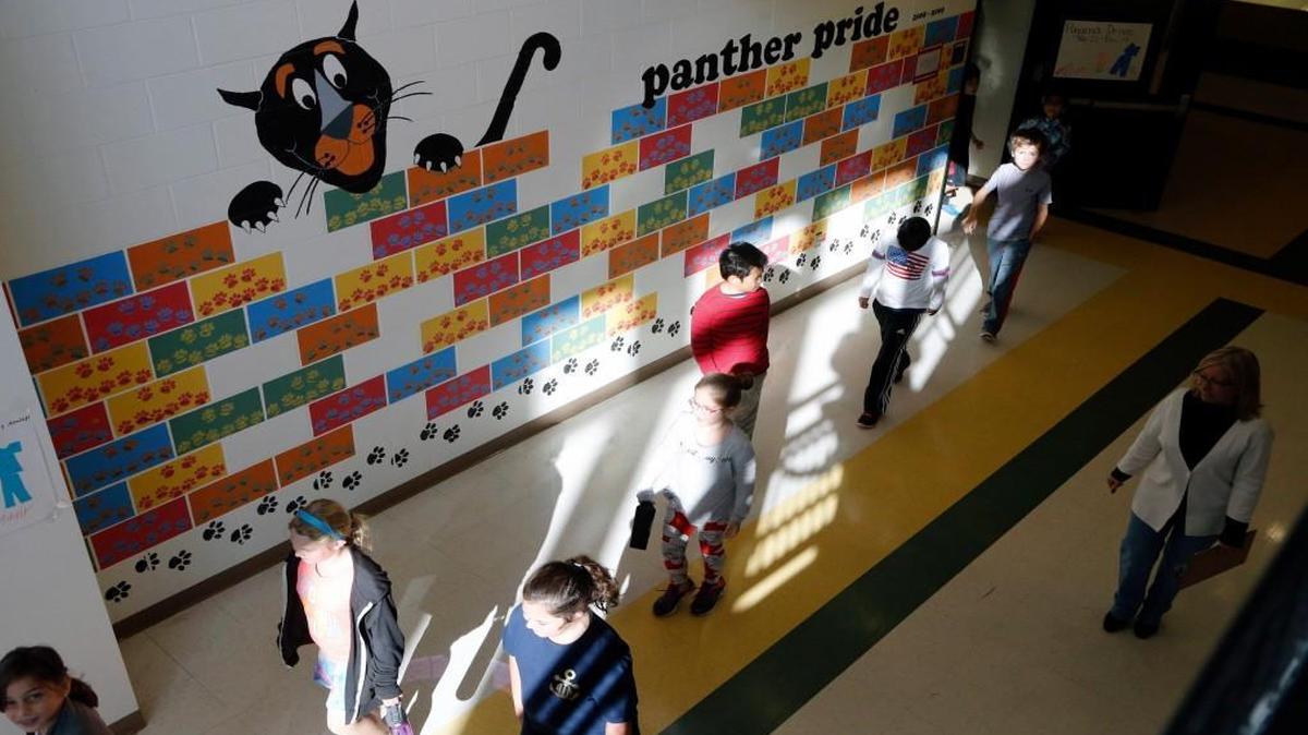Students move between classes at Mills Park Elementary in Cary NC on Nov. 22, 2016. Wake County student assignment staff says the school is overcrowded at 151 percent of its planned capacity.