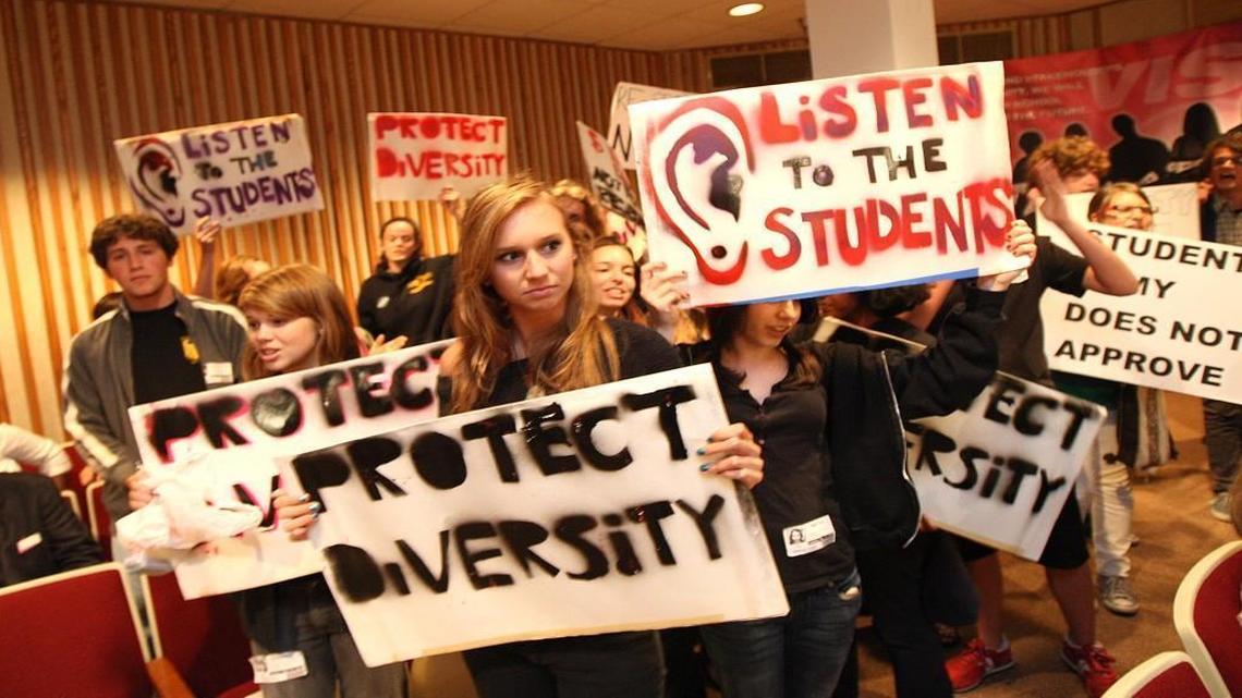 Protestors get up and shout 'hey, hey, ho, ho, resegregation has to go' after the new Republican majority on the Wake County school board voted in 2010 to end the diversity-based student assignment policy. The policy change inspired a 2017 study looking at the impact of political affiliations of North Carolina school board members on school segregation.