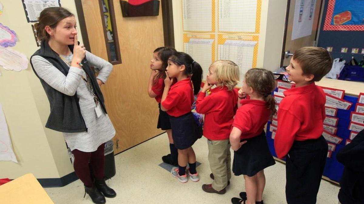 First grade teacher Morgan Perry gets her class ready to head to lunch at Cardinal Charter Academy in Cary, N.C., in this 2015 file photo. A group wants to replicate Cardinal Charter Academy with a site in Chatham County.