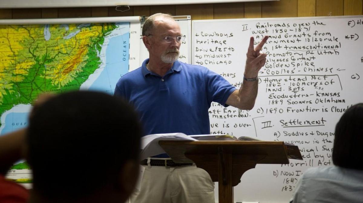 Joe Barley-Maloney teaches a tenth-grade American History II class on Aug. 4, 2014 at Southeast Raleigh High School. The Wake County school plans to revise Southeast Raleigh’s magnet theme to try to generate more interest in the school.