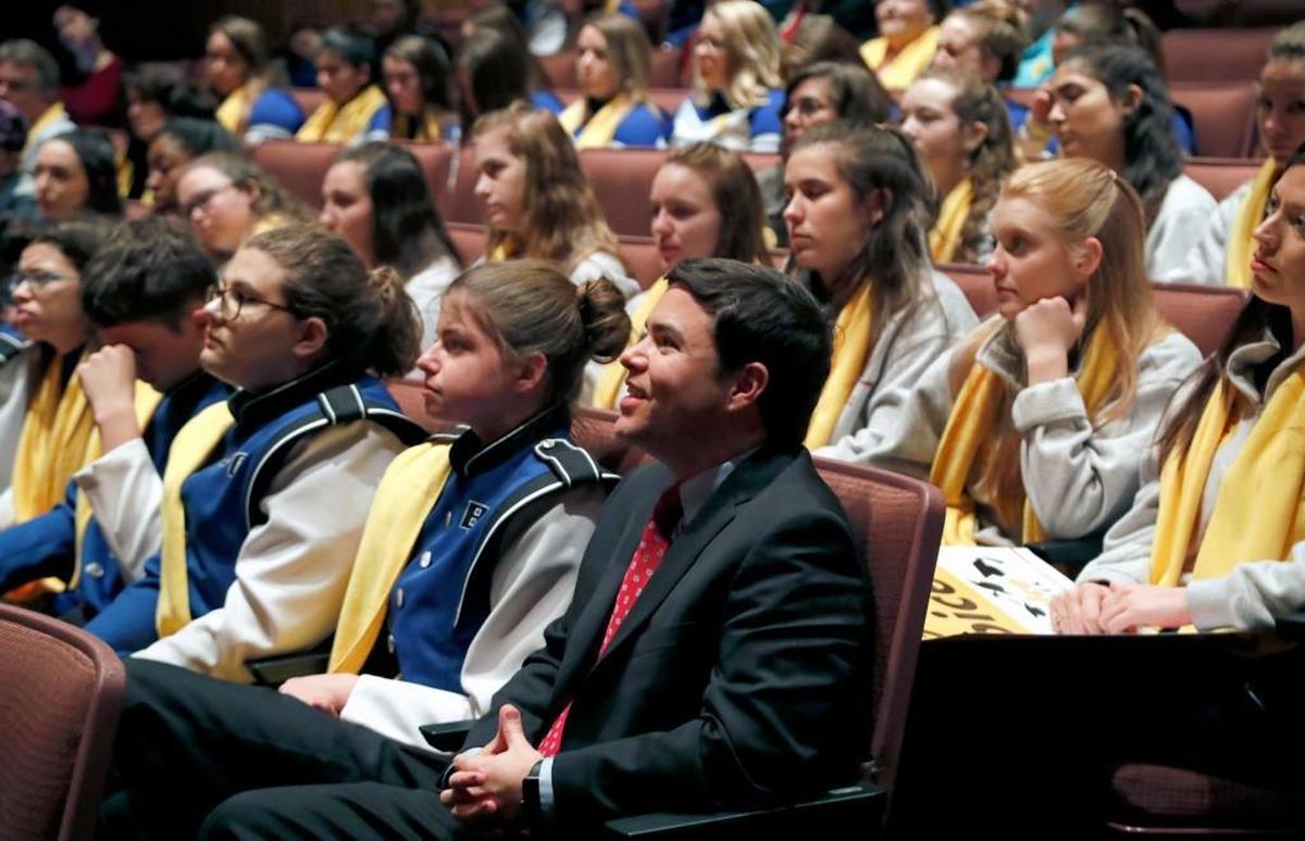 State Superintendent of Public Instruction Mark Johnson, center, sits with the students as he watches one of the presentations at a school choice rally held at the N.C. Museum of History on Jan. 23, 2018. Hundreds attended the rally where Johnson was one of the featured speakers.