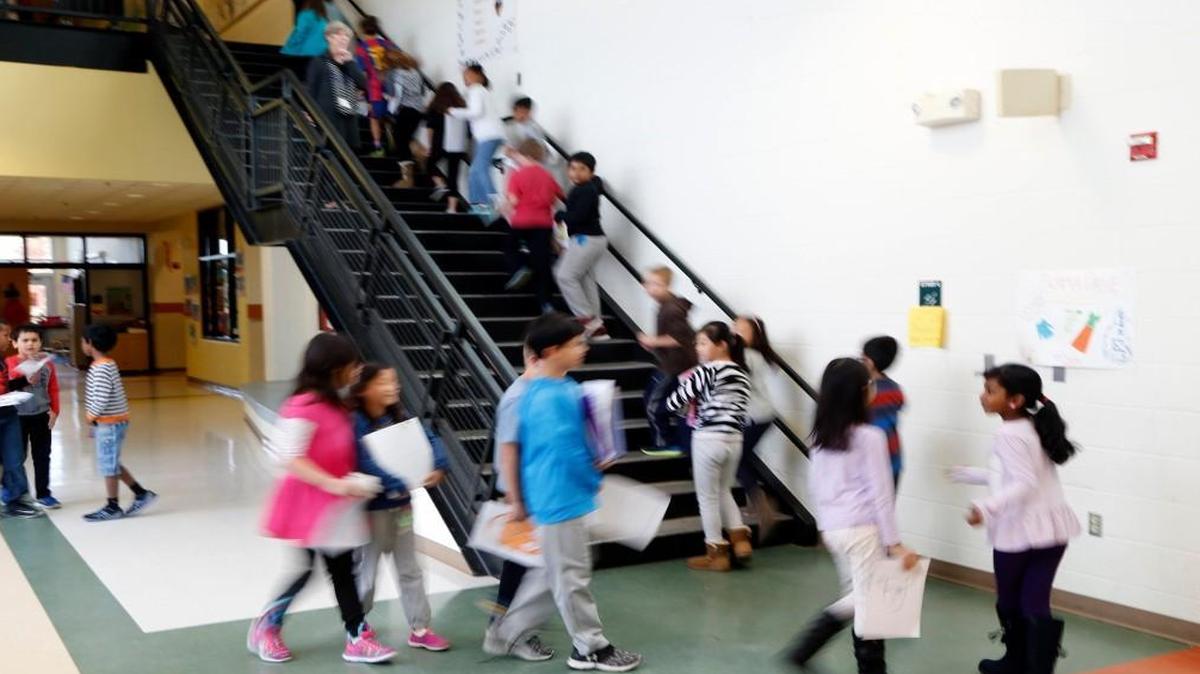 Students move between classes at Mills Park Elementary in Cary NC on Nov. 22, 2016. The Wake County school system is projected to add 28,986 students over the next decade.