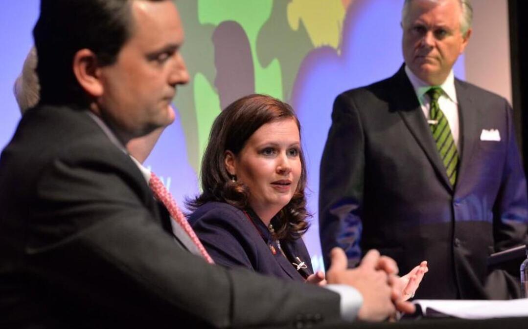 Rep. Rob Bryan, left, attends a May 2014 public forum on teacher pay along with Rep. Tricia Cotham and WBTV news anchor Paul Cameron. Bryan wants to create a pilot program that would allow charters to take over up to five struggling schools.
