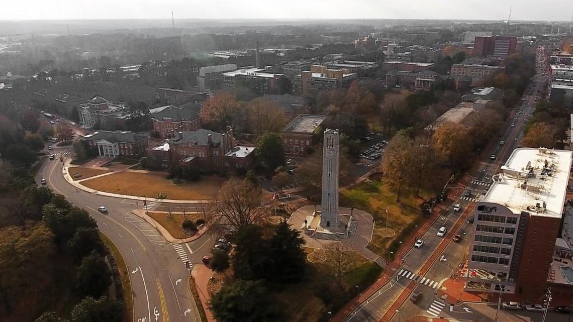 The N.C. State campus sprawls out behind the iconic bell tower on Hillsborough Street in Raleigh, N.C., Thursday, Dec. 14, 2017. A recent gift to the university will have real bells installed 70 years after the iconic structure was completed. The chimes that come from the structure are now electronically produced and played through speakers atop the structure.