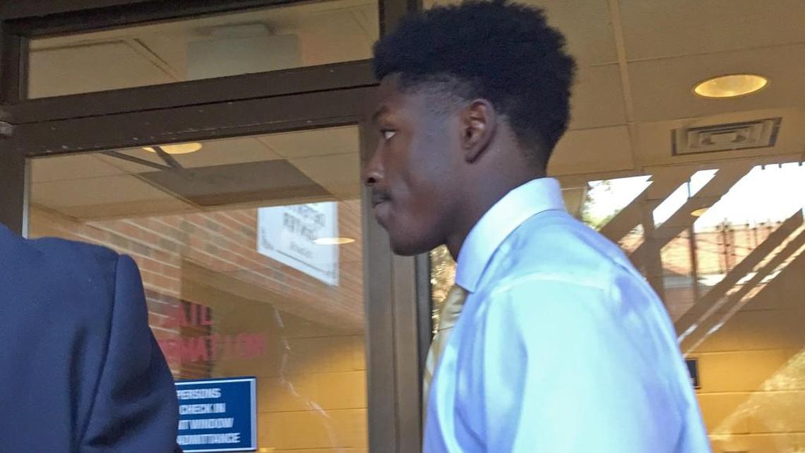 Allen Artis walks into the Orange County Magistrate's Office in Hillsborough, N.C., for booking on misdemeanor sexual battery and assault charges. He was released on a $5,000 unsecured bond.