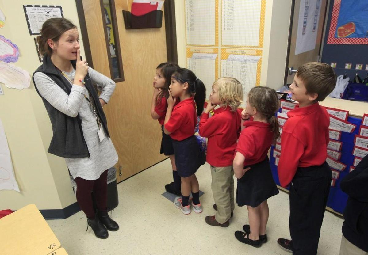 First-grade teacher Morgan Perry gets her class ready to head to lunch at Cardinal Charter Academy in Cary on Wednesday, Dec. 2, 2015. Wake County school leaders say they are seeing slower growth because of the rise of charter schools.