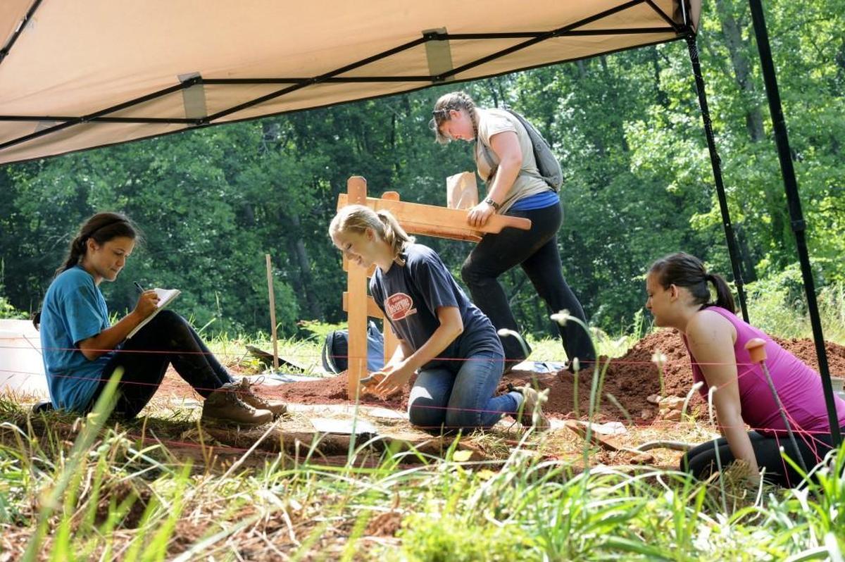 Western Carolina University students work on a mock crime scene involving buried remains in this file photo.