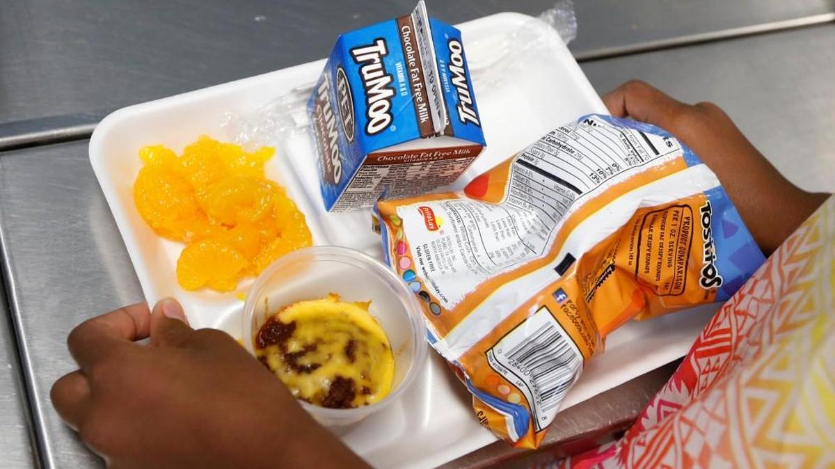 A student gets a lunch of beef tacos at Partnership Elementary School in Raleigh, NC, on April 21, 2016. Unlike charter schools, Partnership and other traditional public schools are required to participate in the federal school lunch program.