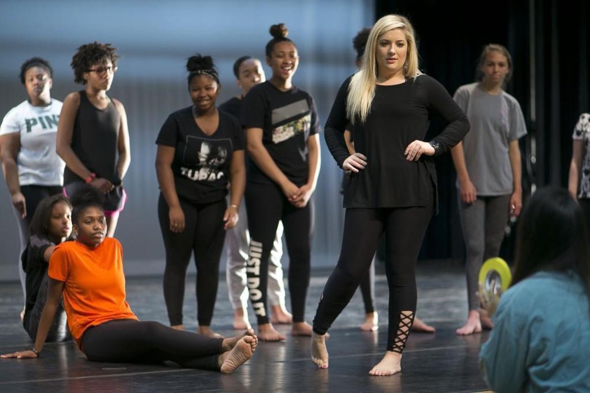 Broughton High School dance teacher Betsy Graves listen to student Anna Rae Wood during their Dance I class on on Tuesday, May 9, 2017 in the auditorium at Broughton High School in Raleigh, N.C. Graves was named the 2017-18 Wake County Teacher of the Year.