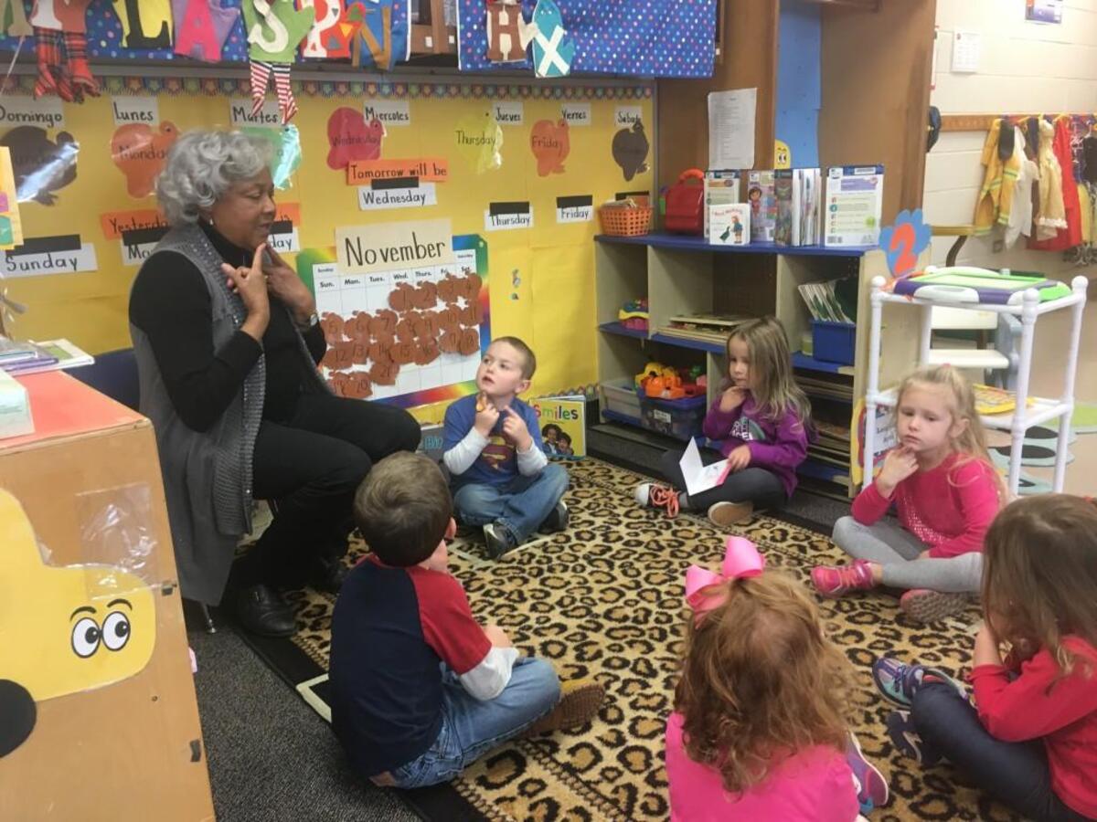 Paulette Hicks, director of the Athens Drive Child Development Center at Athens Drive High School in Raleigh, N.C., works with the children on Tuesday, Nov. 21, 2017.