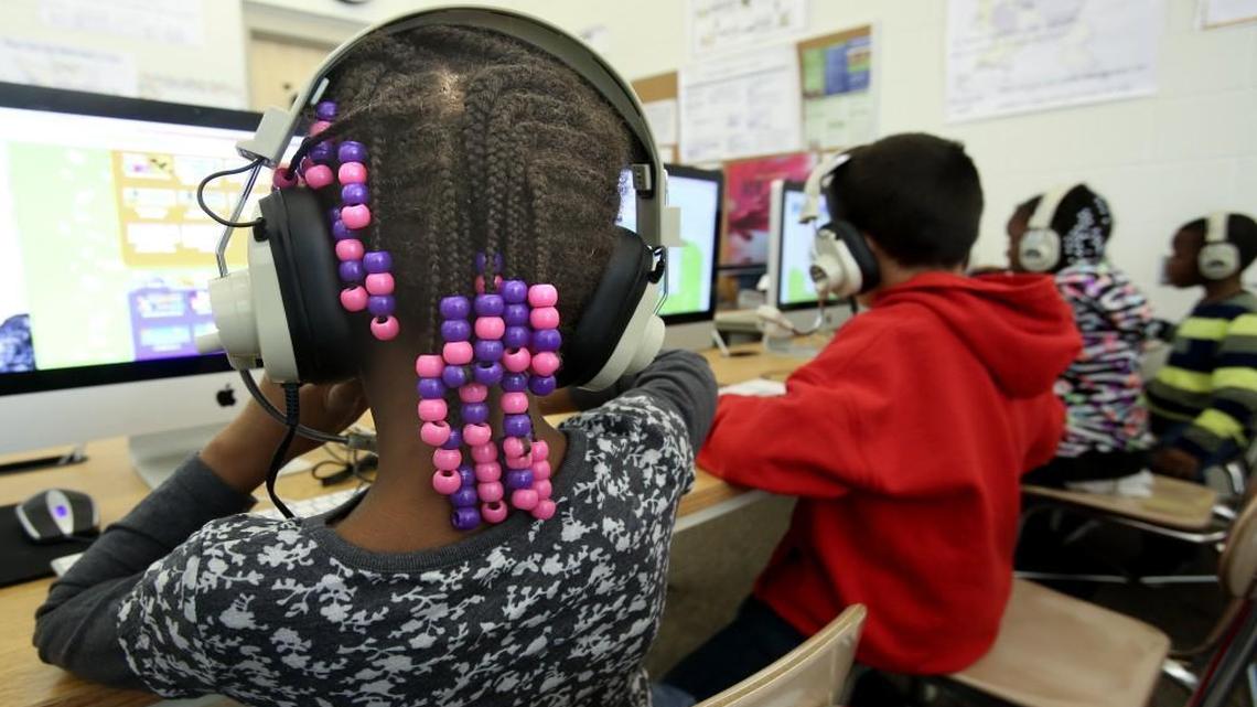 Walnut Creek Elementary School students work in the technology classroom on Dec. 4, 2014. Walnut Creek is one of 12 Wake County schools that might switch to a year-round calendar.