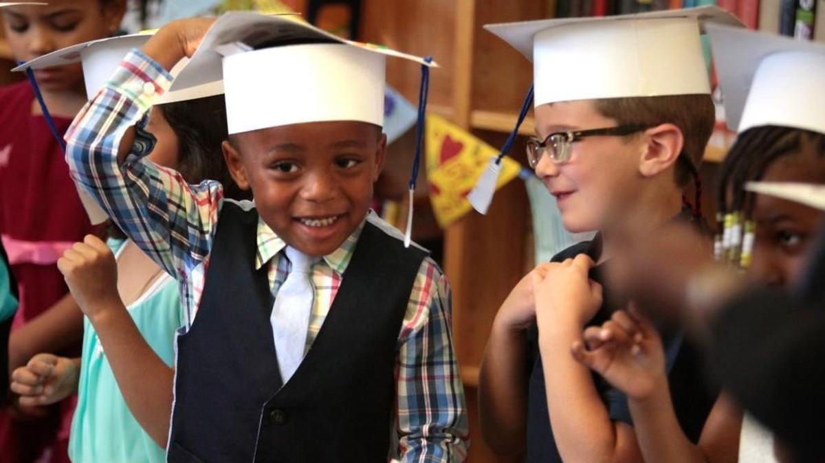 From left, Nazir Best and Jackson Foy attend their pre-K graduation at Aversboro Elementary School in Garner on June 9, 2016.