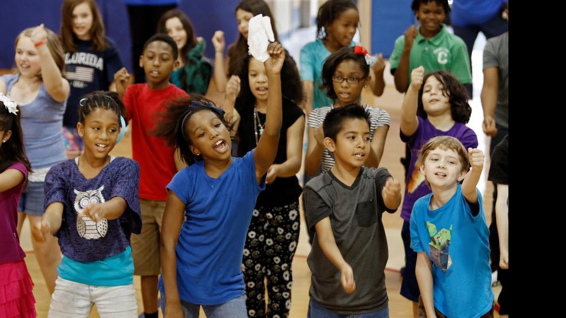 
Wendell Elementary Magnet 5th graders sing their end of grade (EOG) shake it off song and dance in the school gym to Taylor Swift's 'Shake It Off' tune Friday, May 15, 2015 during the school's celebration of having been named the Best Magnet Elementary School in America this year. The Wendell, NC Magnet elementary school has 465 students grades K-5 with a staff of 75 school employees. 
