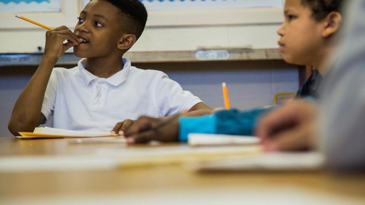 Zaman Timmons, left, and Ethan Rivers, fifth-graders at Montlieu Academy of Technology in High Point, participate in a math class for intellectually gifted students.