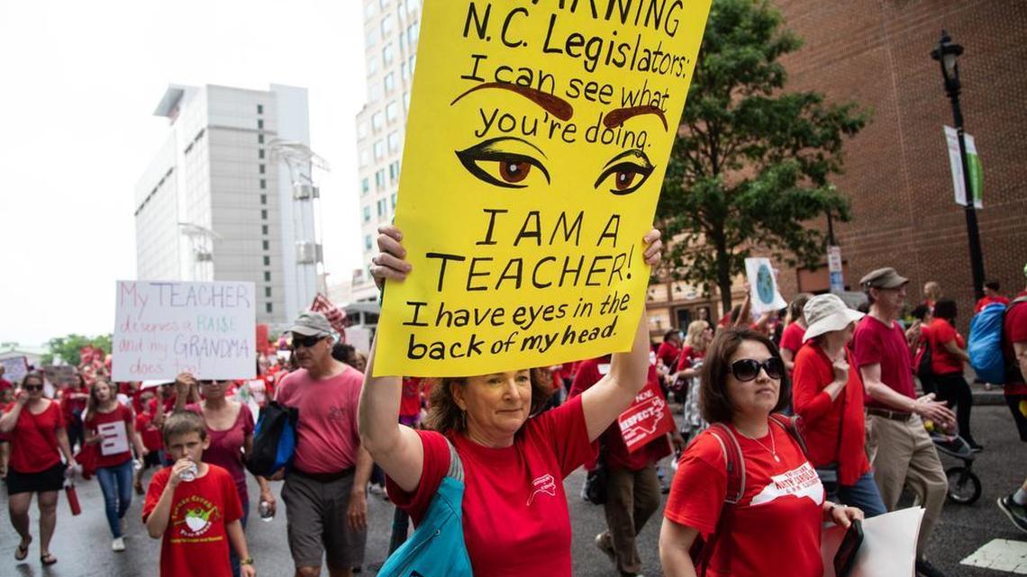 Thousands of teachers march on Fayetteville Street to the N.C. Legislative building in Raleigh, N.C. Wednesday, May 16, 2018 during the “March for Students and Rally for Respect,” the largest act of organized teacher political action in state history.