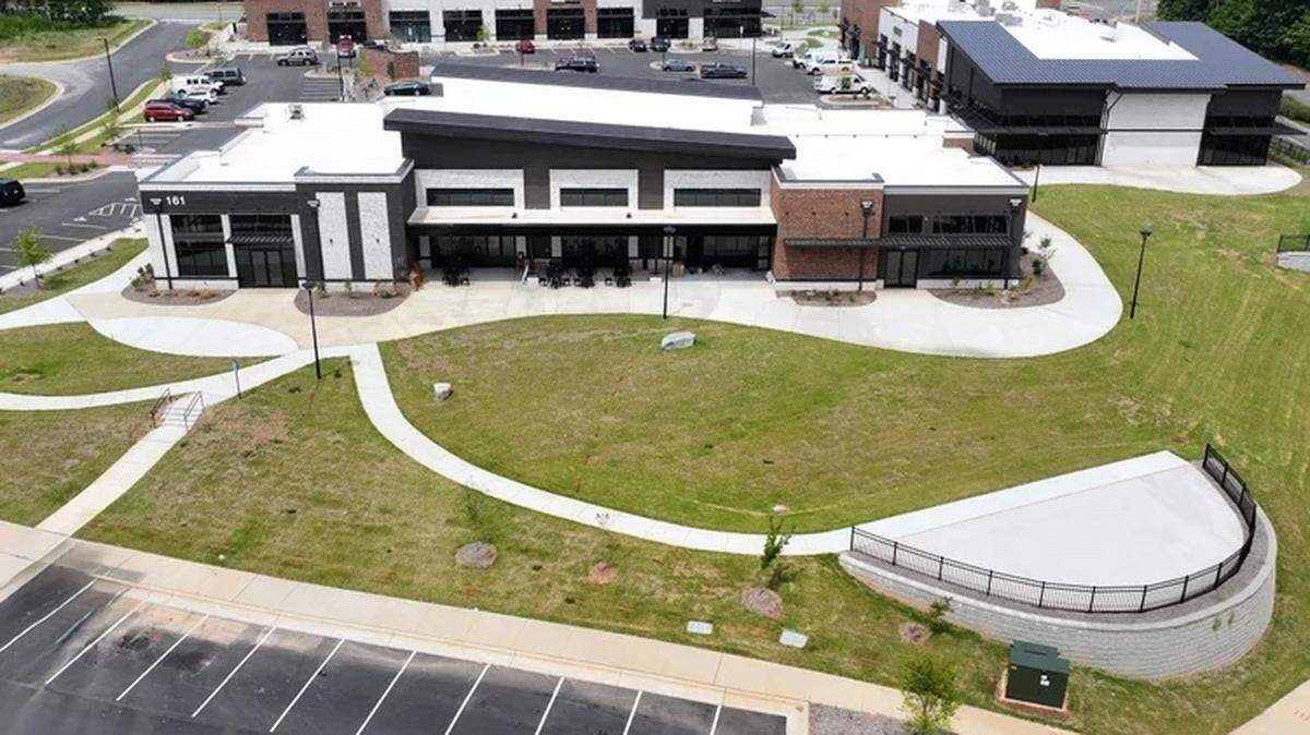 A Wake County development is drawing new tenants, including a popular breakfast and brunch restaurant.