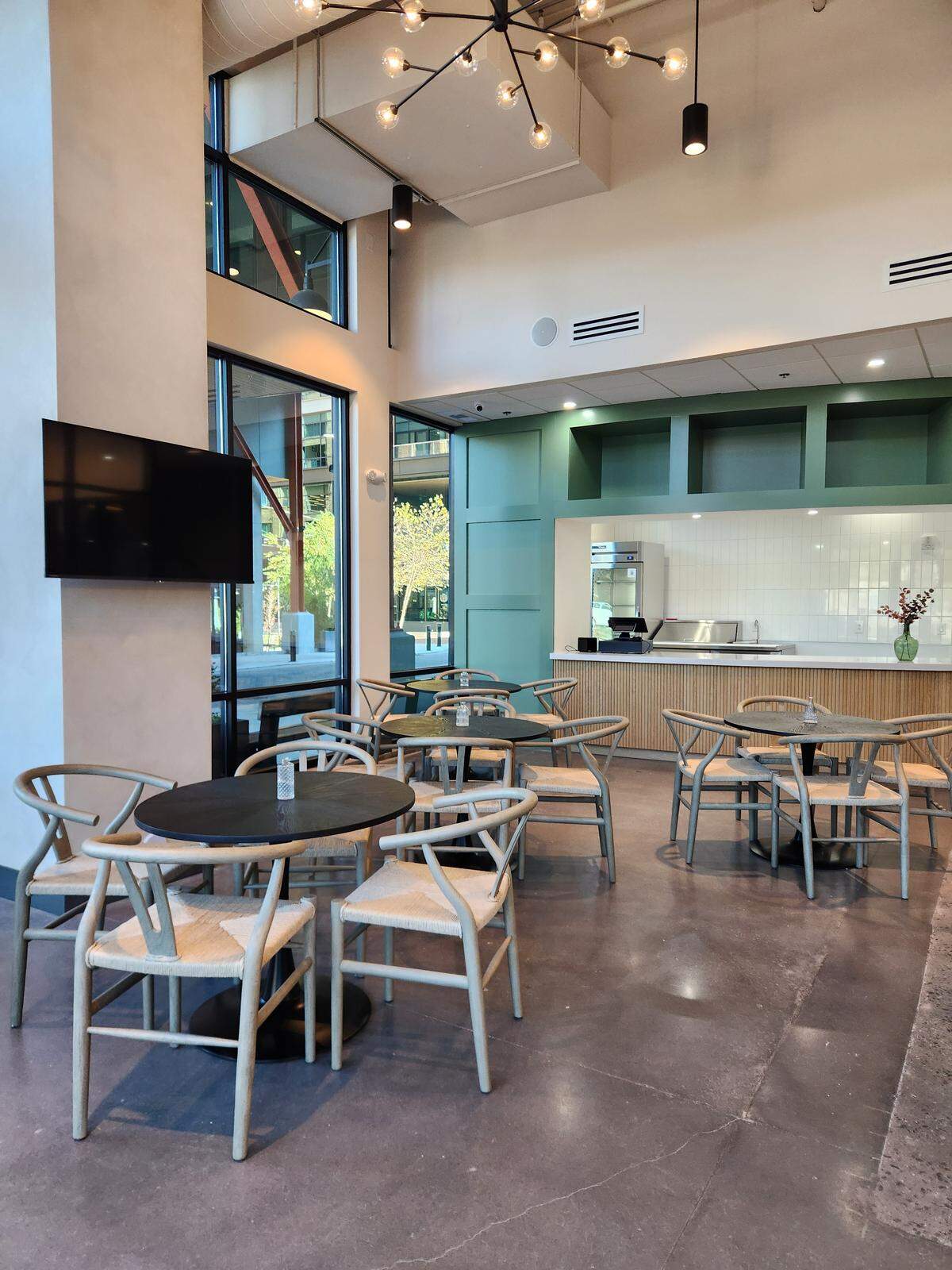 Customers who order sandwiches from the Garlic Bay counter can eat at tables inside. The tables can also be used during cooking classes, so participants can eat the meals they just prepared.