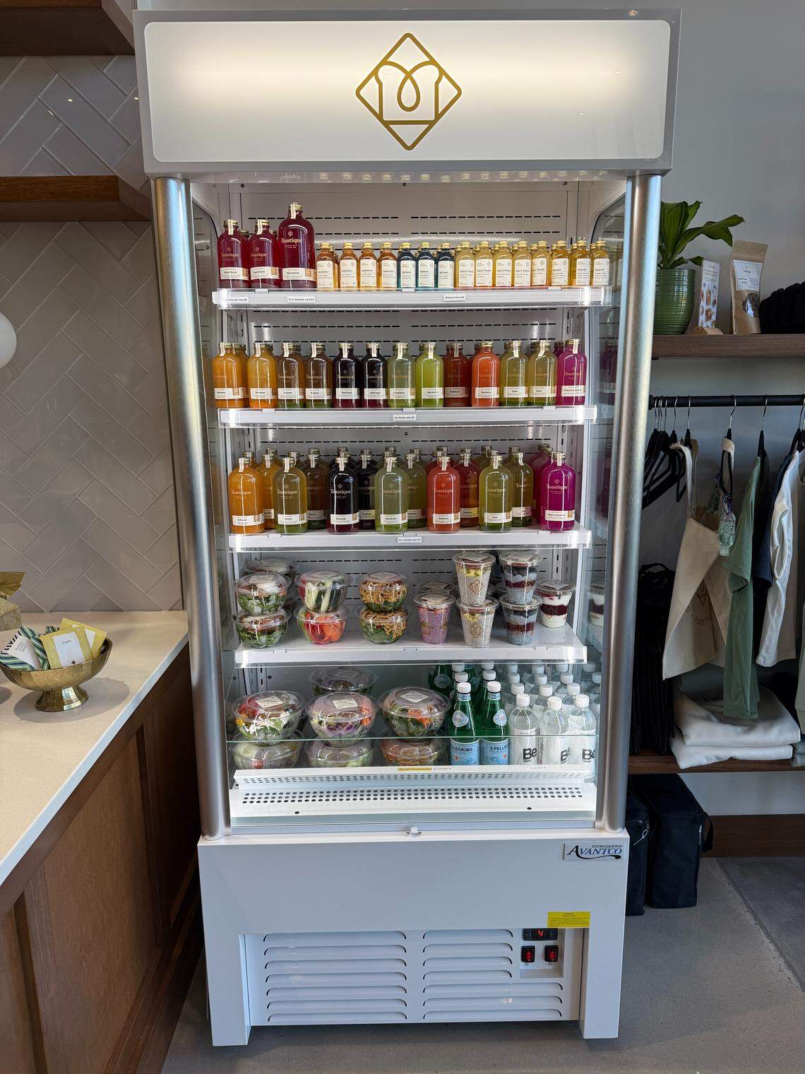 Inside 1000 Social’s new cafe Toastique, customers can find salads, chia pudding, juice and bottled drinks in a refrigerator.