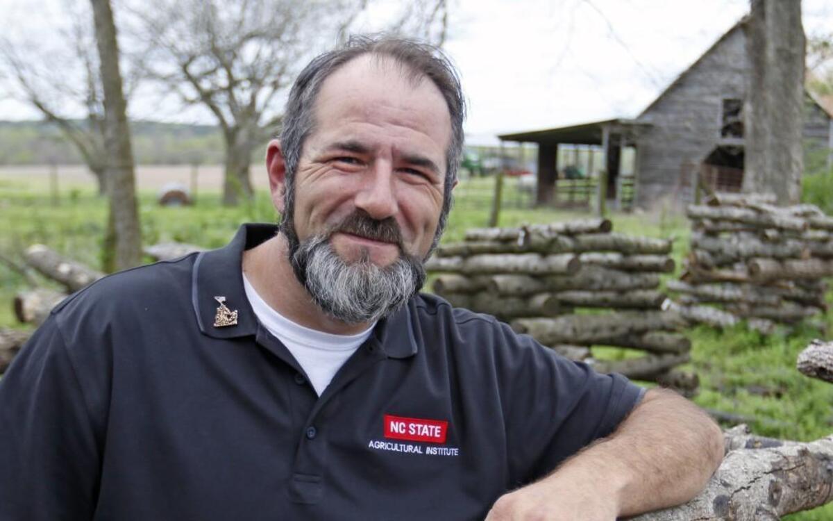 Robert Elliott, a Marine veteran who is a sustainable farmer, poses on his farm near Louisburg, NC, on Friday, April 1, 2016. Elliott has become known for his innovative farming methods and also for helping other veterans transition to jobs in agriculture. He farms on about 40 acres of a much larger family farm in the Justice community of Franklin County, NC.